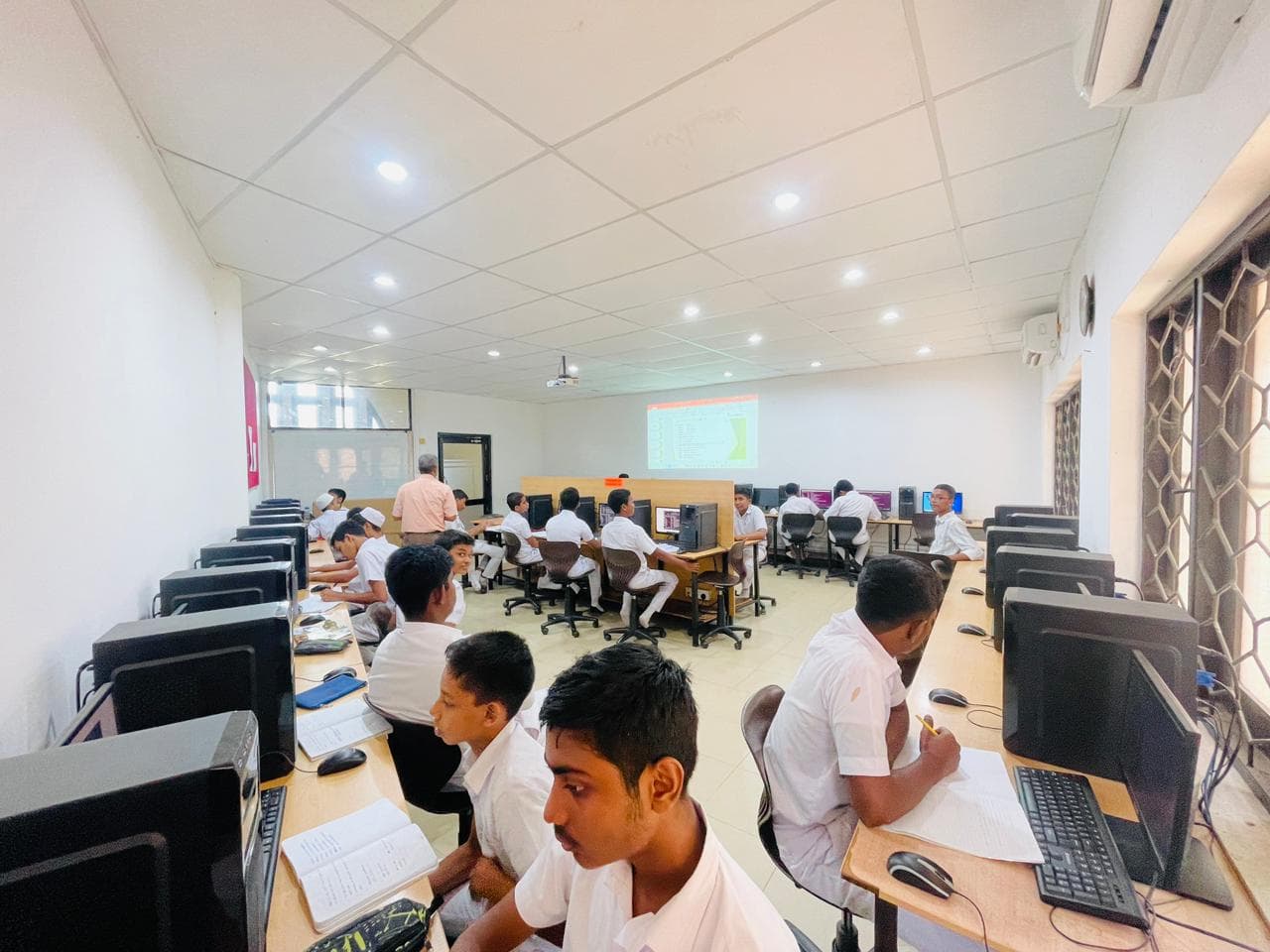 Students in a school outreach lab