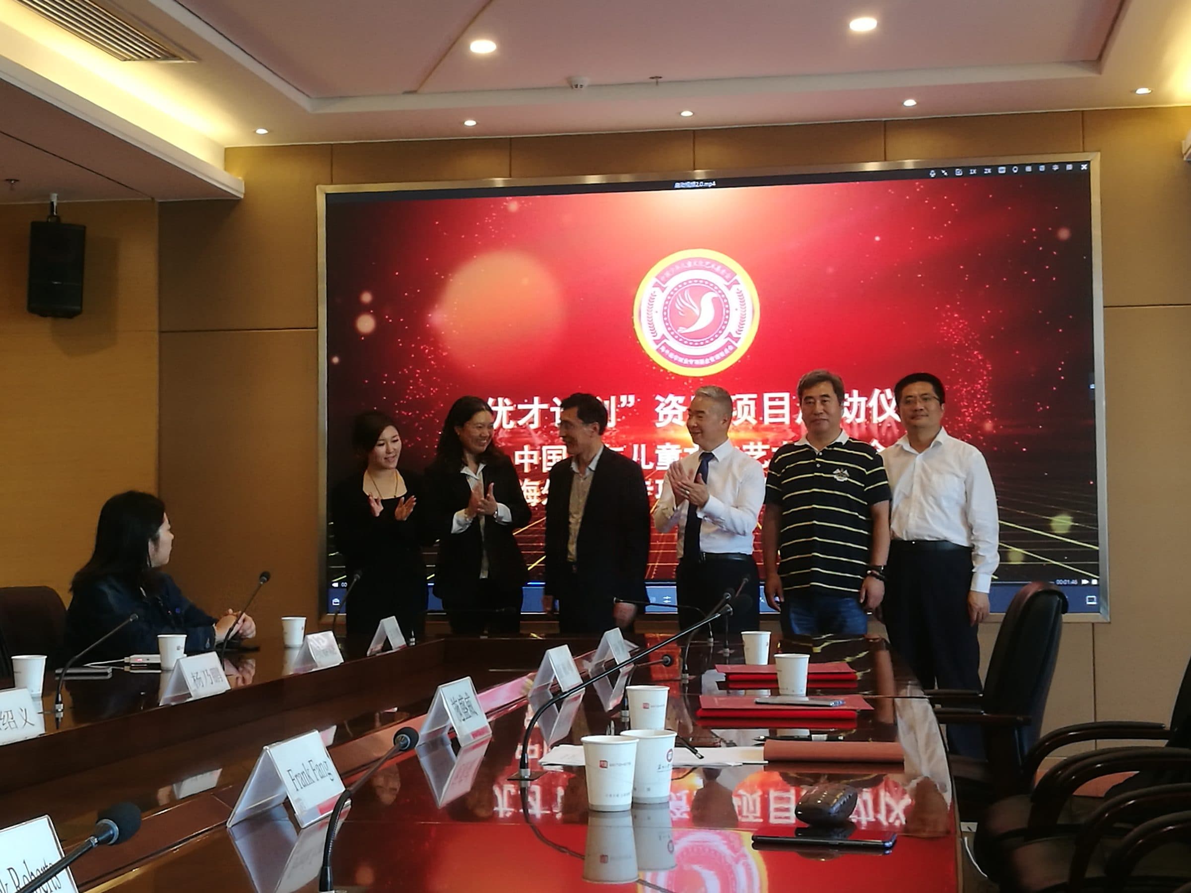 Group photo at a partnership signing ceremony